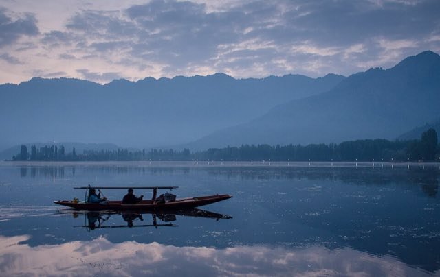 Shikara on Dal Lake at sunset